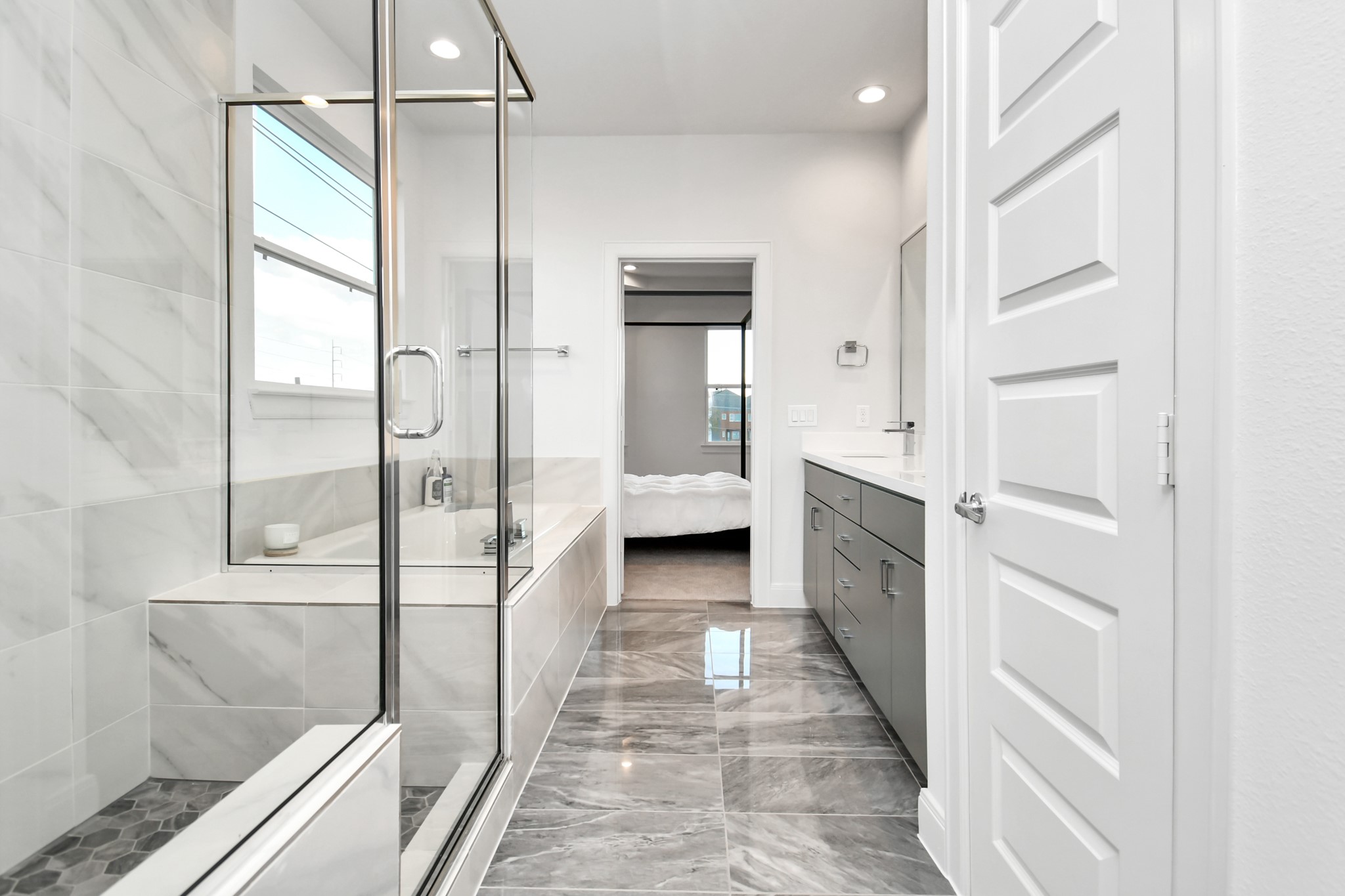 1905 Maury Street, Unit A Houston, TX 77026 - Photo 37 of 44 a bathroom with a double vanity sink and toilet