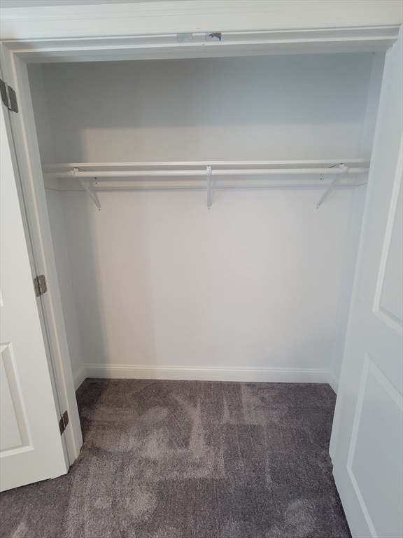 55 Arlington Street, Unit 7 Brockton, MA 02301 - Photo 15 of 37 a view of an empty walk in closet