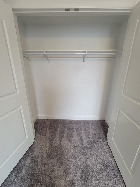 55 Arlington Street, Unit 7 Brockton, MA 02301 - Photo 19 of 37 a view of an empty walk in closet