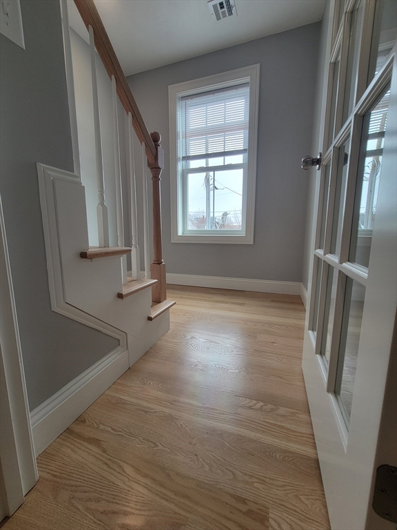 55 Arlington Street, Unit 7 Brockton, MA 02301 - Photo 22 of 37 wooden floor and window in a room