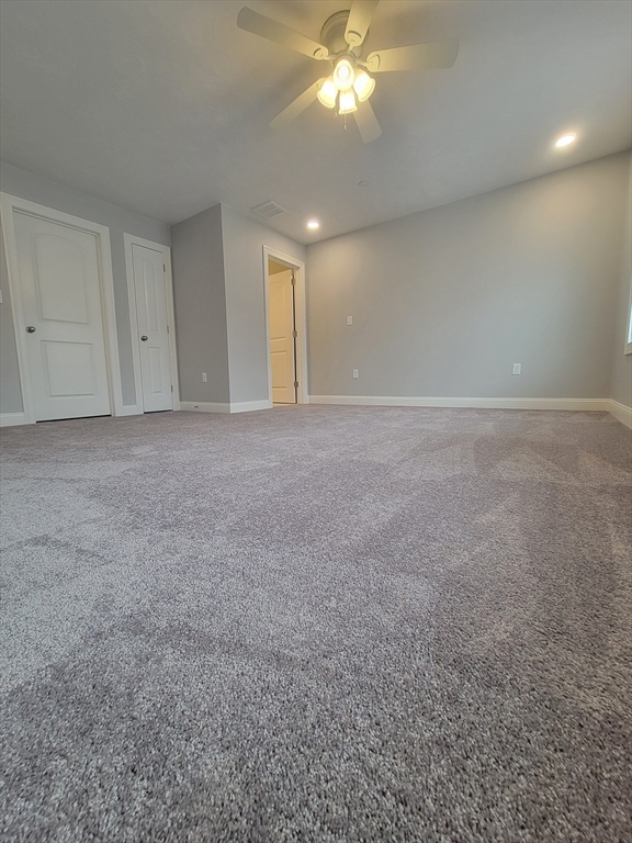 55 Arlington Street, Unit 7 Brockton, MA 02301 - Photo 26 of 37 a view of a big room with a ceiling fan and entryway