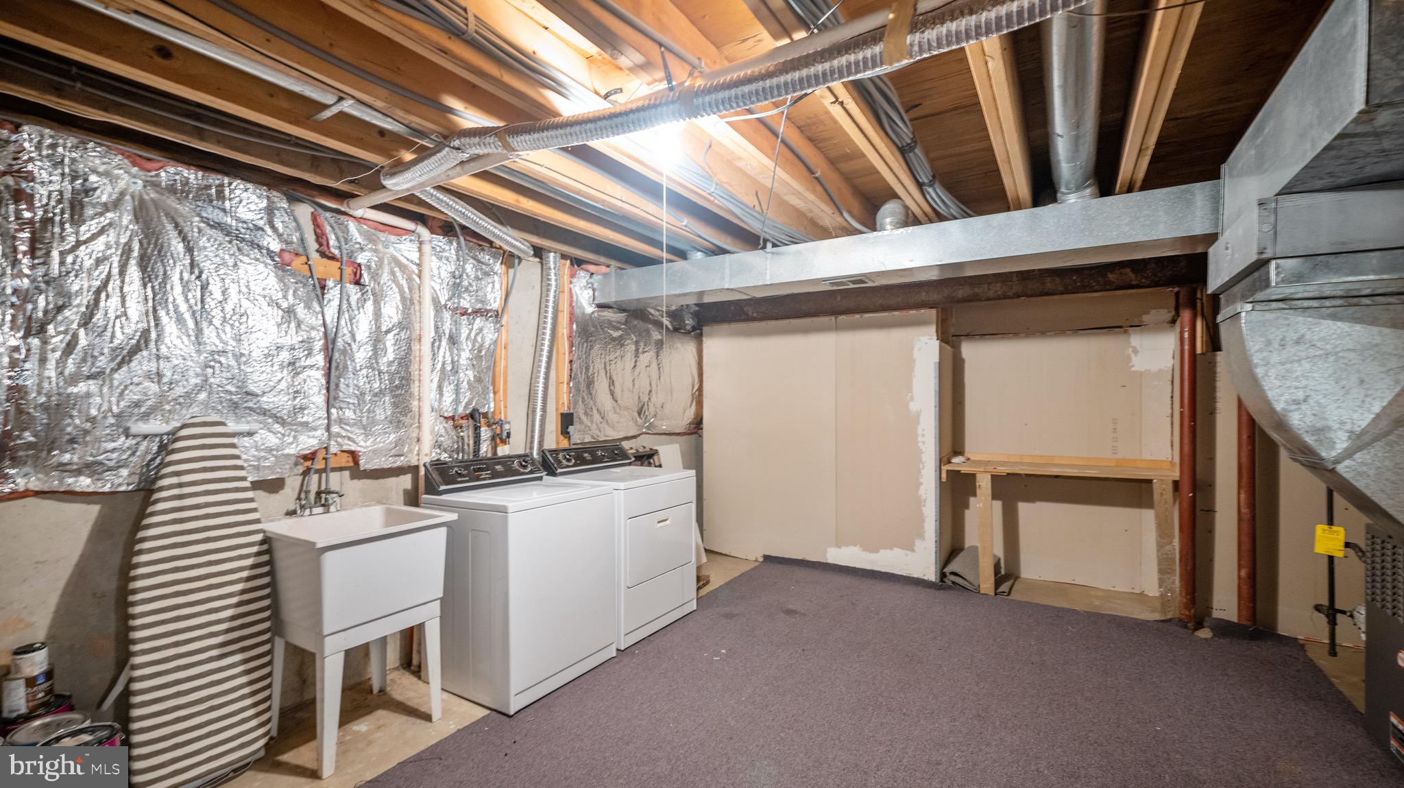 14016 Eternity Road Germantown, MD 20874 - Photo 28 of 36 Basement laundry/storage