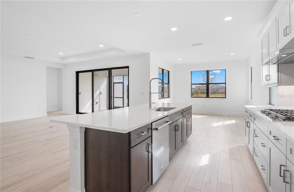 5770 Freestone Circle Apollo Beach, FL 33572 - Photo 11 of 29 a large white kitchen with a large window