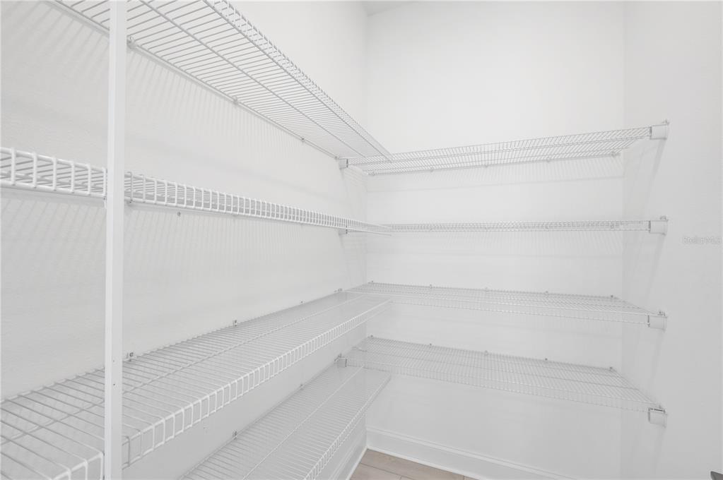 5770 Freestone Circle Apollo Beach, FL 33572 - Photo 12 of 29 a view of an empty walk in closet