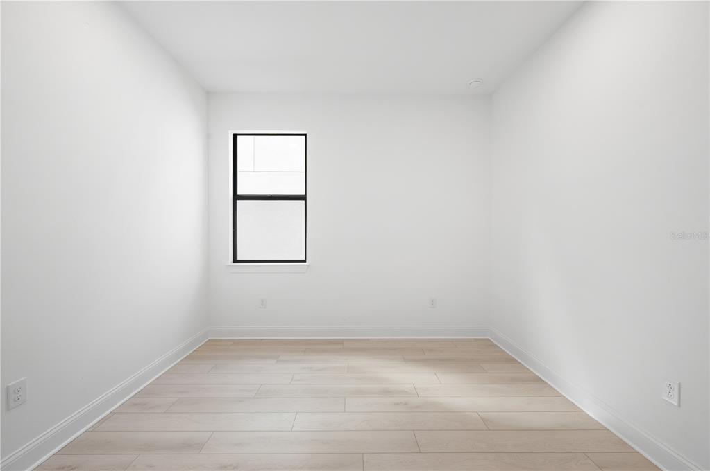 5770 Freestone Circle Apollo Beach, FL 33572 - Photo 23 of 29 an empty room with a window