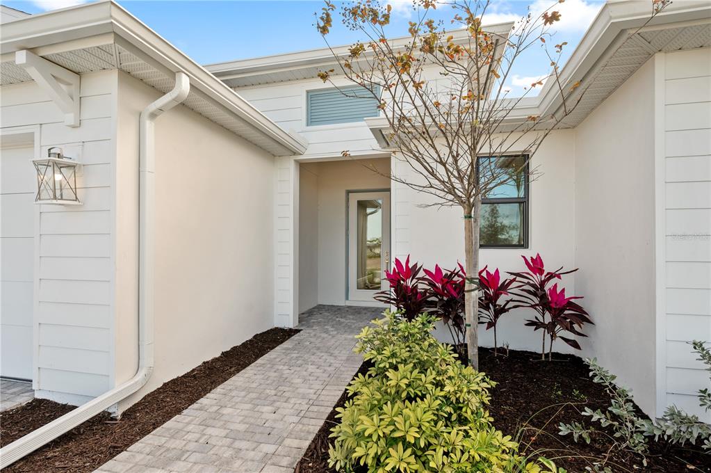 5770 Freestone Circle Apollo Beach, FL 33572 - Photo 3 of 29 a vase of flowers sitting on a floor