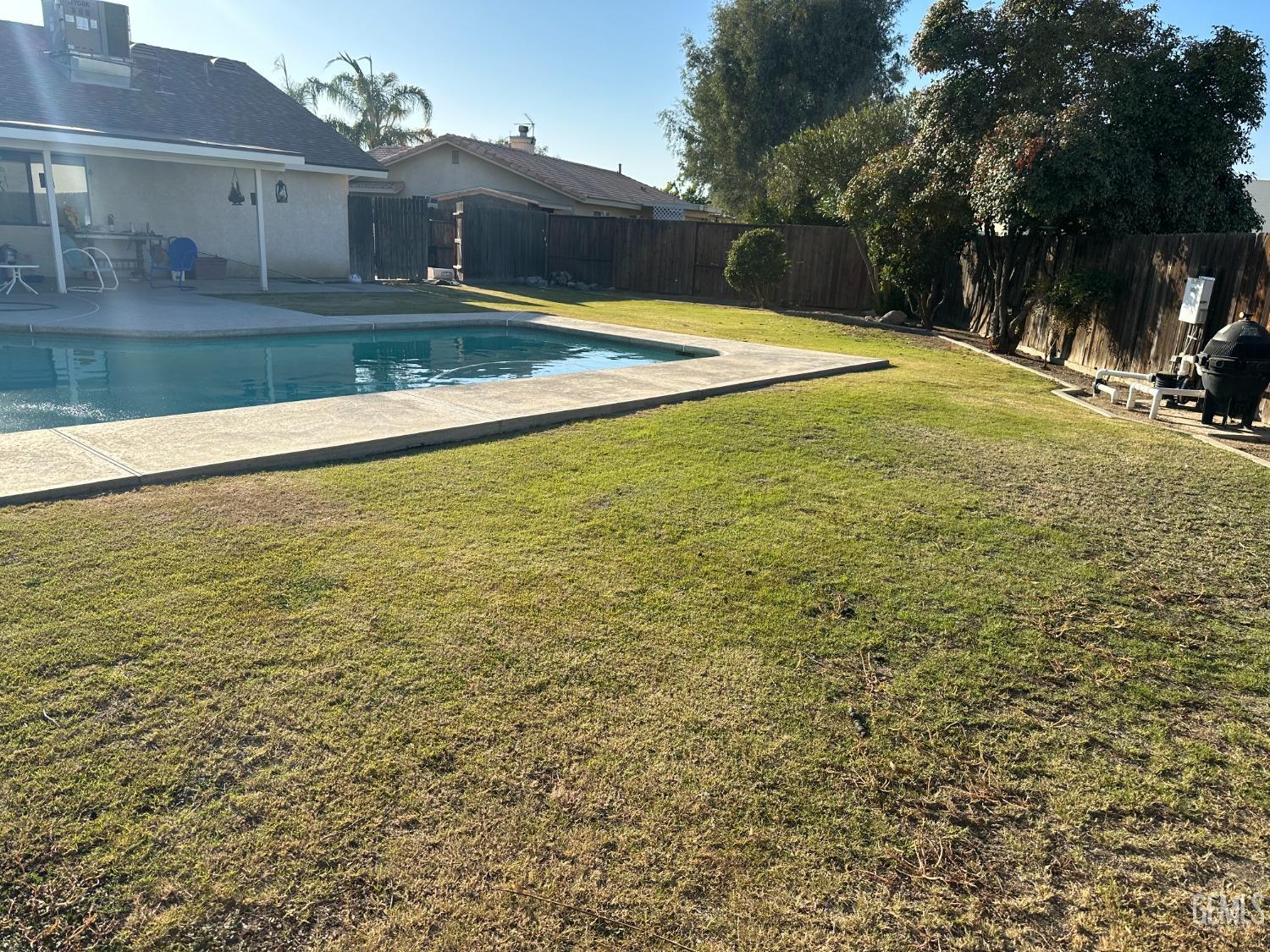 Undisclosed Address Wasco, CA 93280 - Photo 3 of 3 a view of a backyard of the house