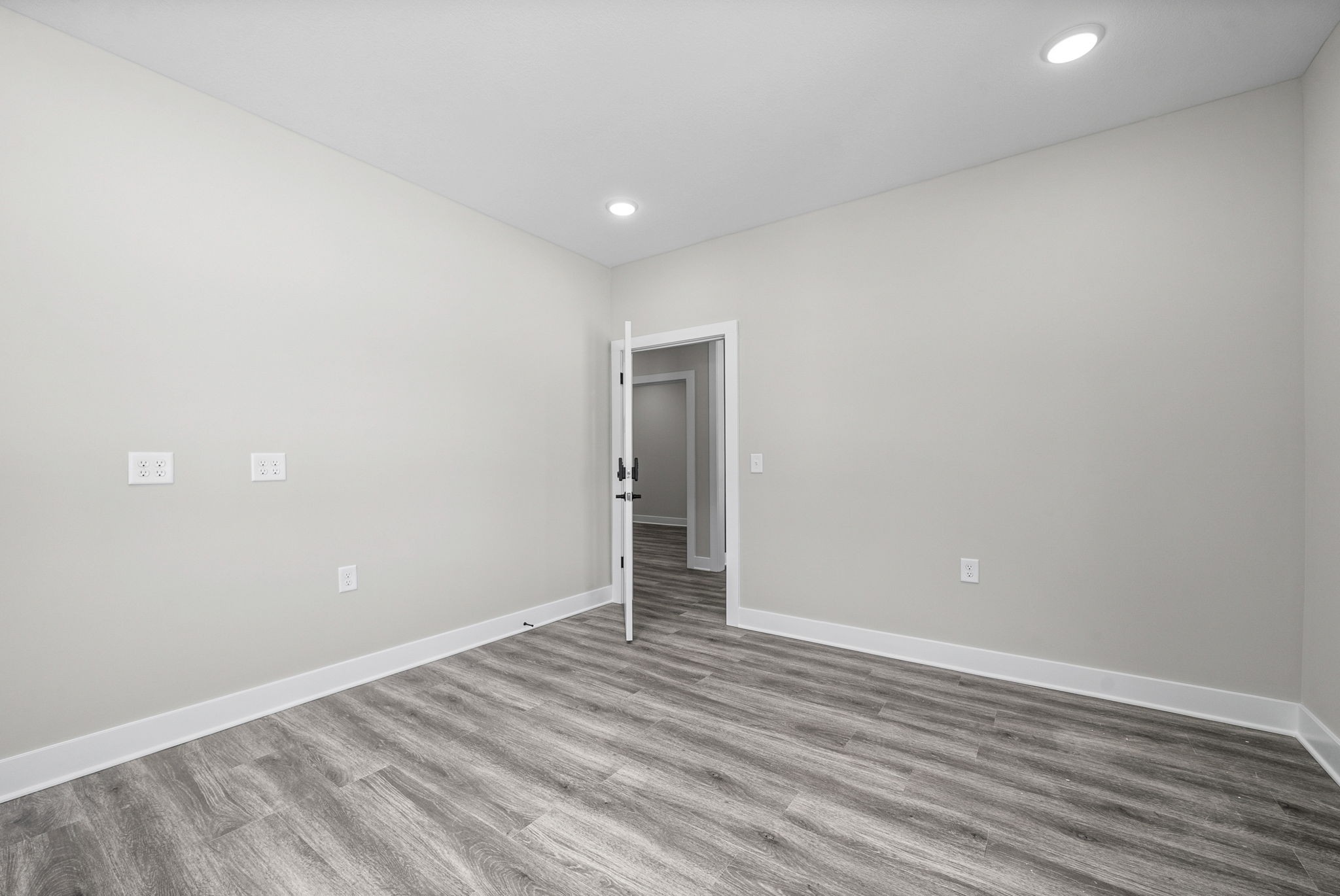 2510 Pea Ridge Road Clarksville, TN 37040 - Photo 12 of 40 a view of an empty room with wooden floor and closet