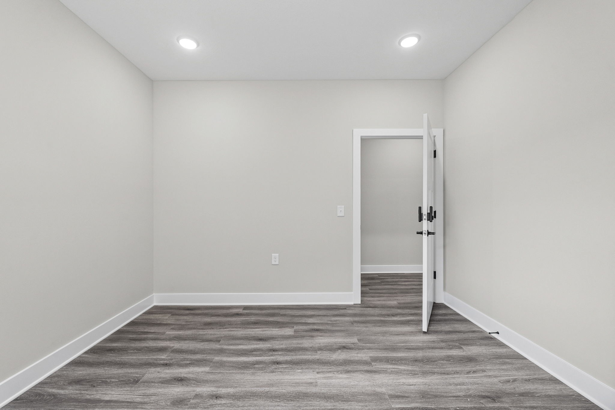 2510 Pea Ridge Road Clarksville, TN 37040 - Photo 18 of 40 an empty room with wooden floor