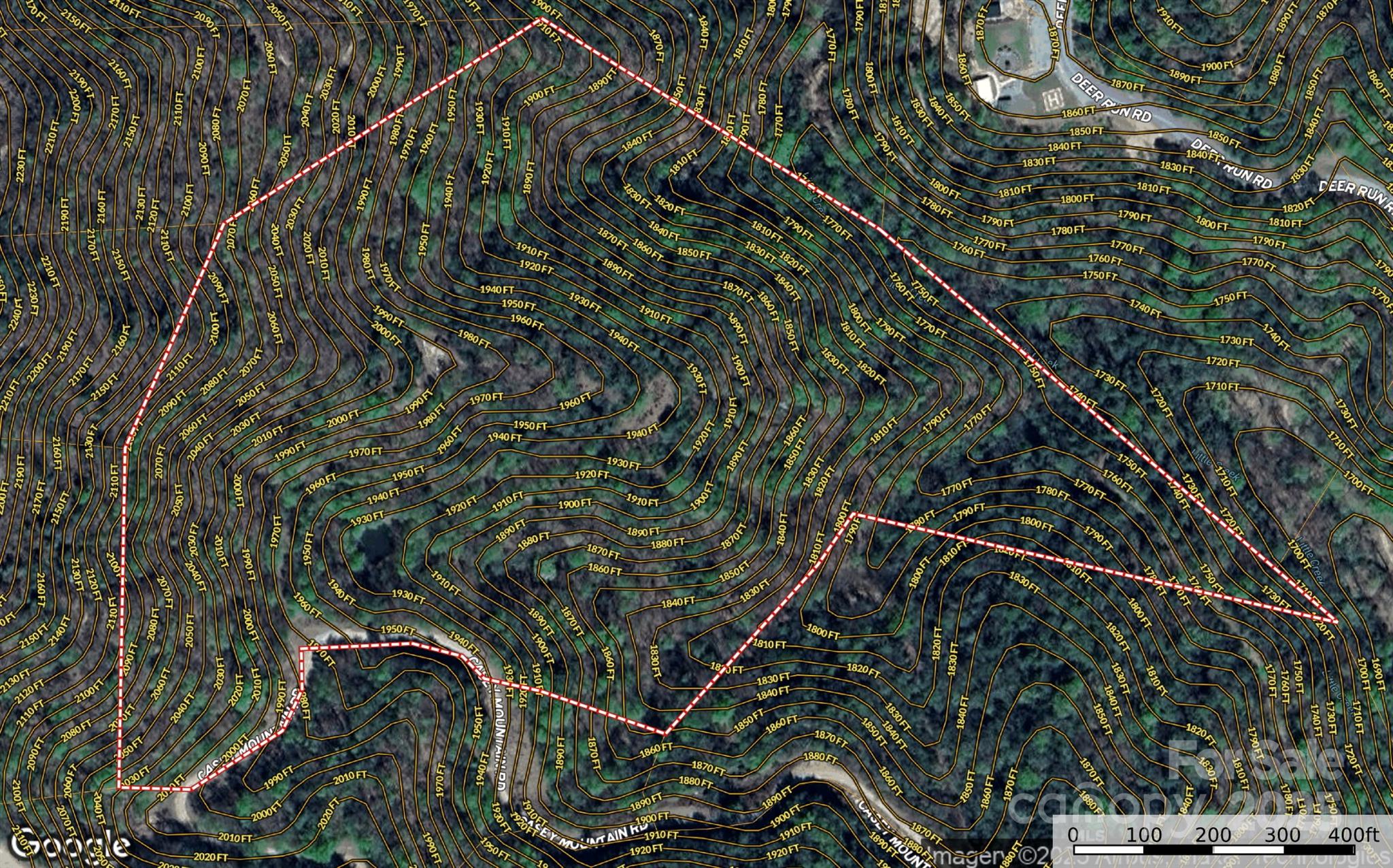 Tbd Casey Mountain Road, Unit 218 Purlear, NC 28665 - Photo 16 of 45 a backyard of a house with lots of green space and trees