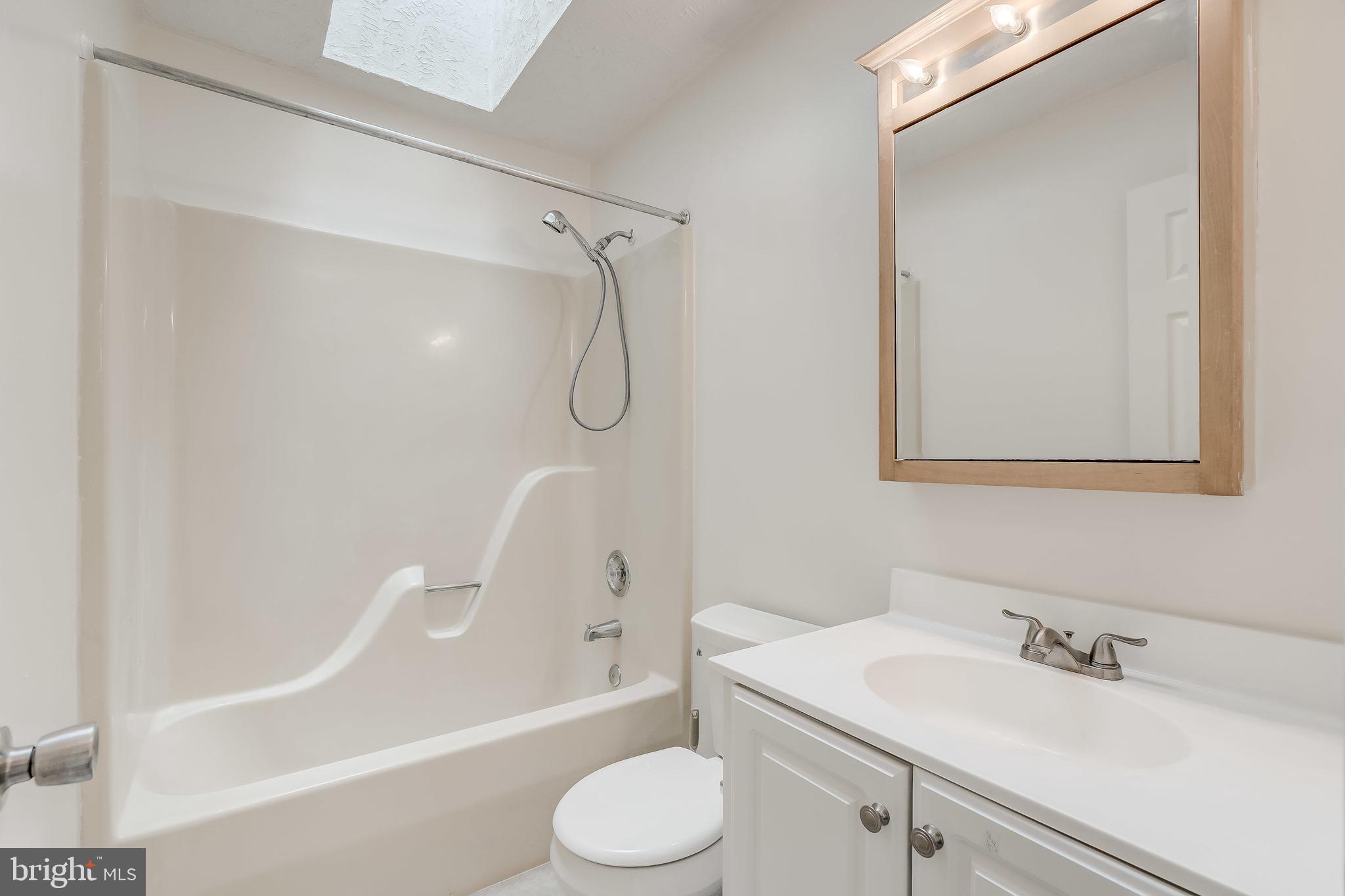 545 Fairmount Road Linthicum, MD 21090 - Photo 20 of 35 Hallway Full Bathroom with Skylight