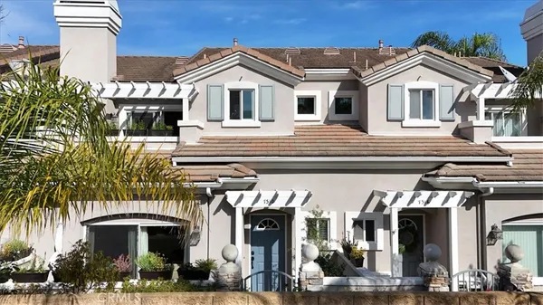 a front view of a house with a porch