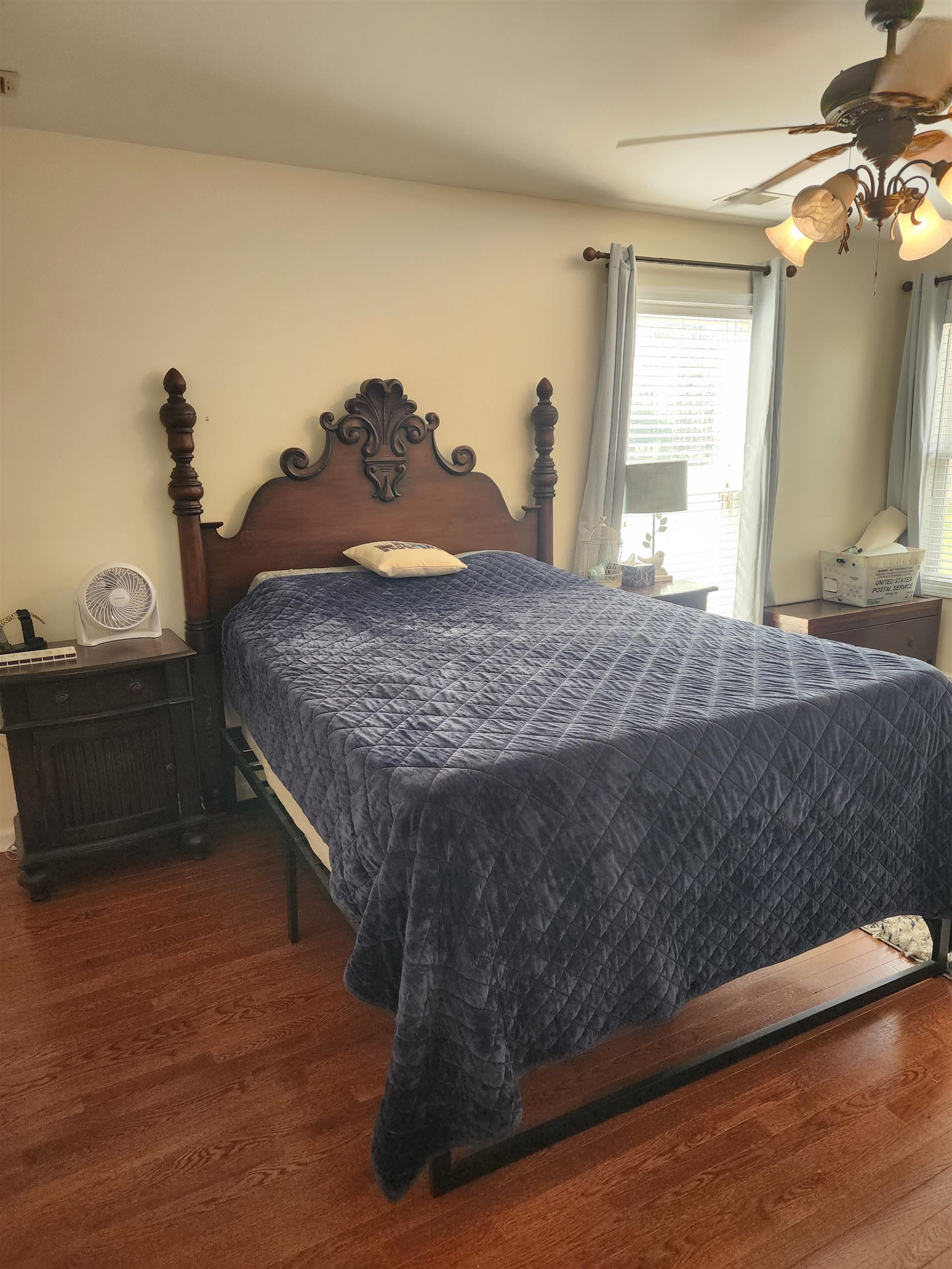 620 Old Road Counce, TN 38326 - Photo 22 of 32 a bedroom with a bed and two windows