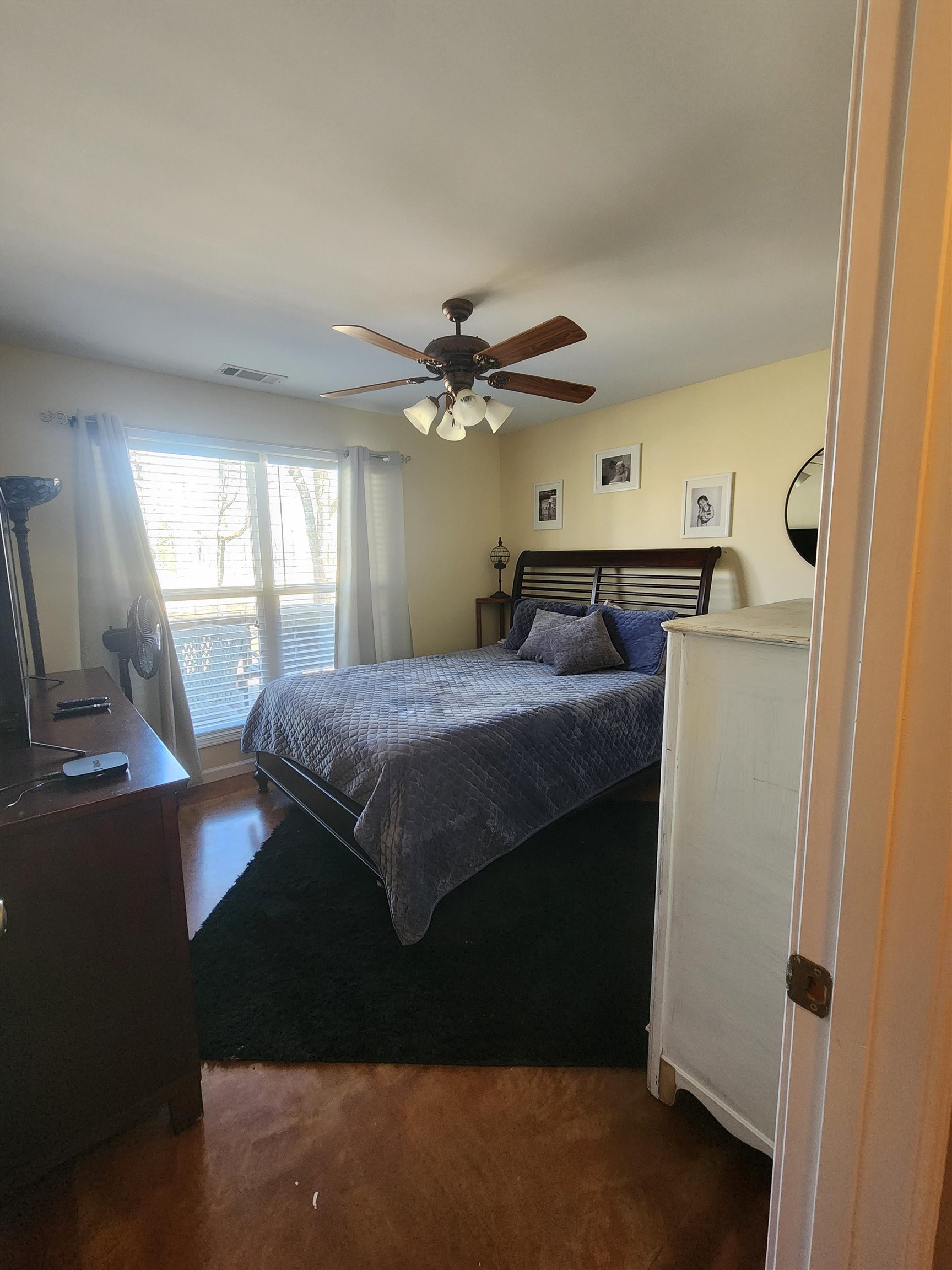 620 Old Road Counce, TN 38326 - Photo 30 of 32 a bedroom with a bed and window
