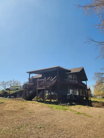 a view of a swimming pool with an outdoor space and seating area