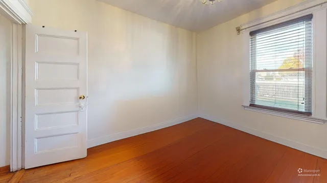 an empty room with a window