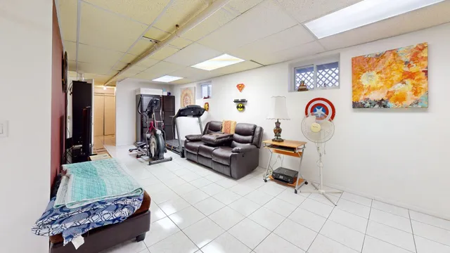 a living room with couch and a table