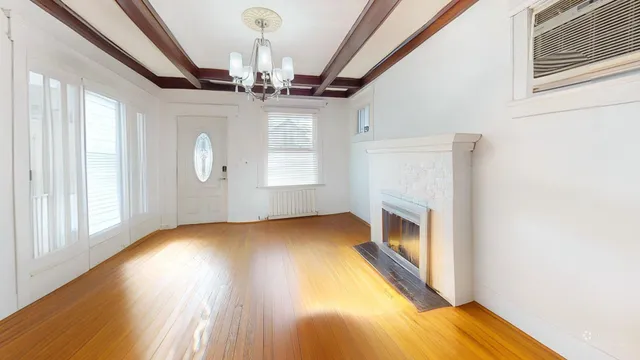 a view of an empty room and window