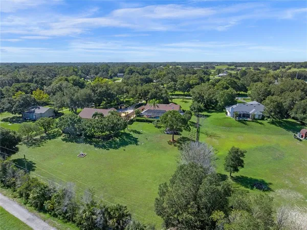 a view of a garden with an ocean