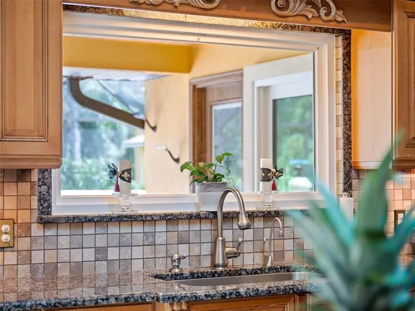 a living room with fireplace furniture and a flat screen tv