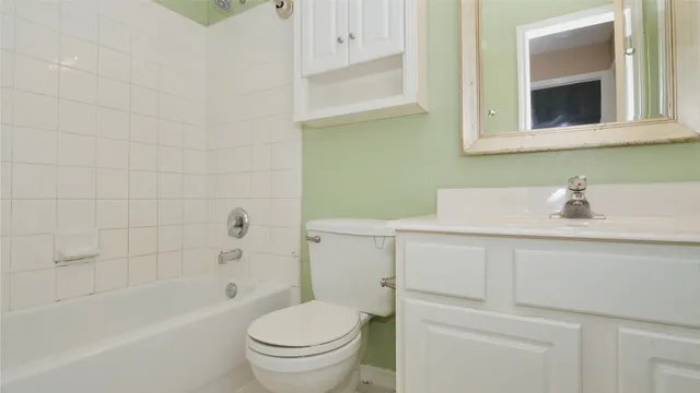 a bathroom with a sink a shower and a mirror