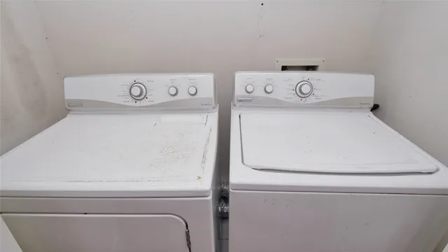 a view of green field with a small yard