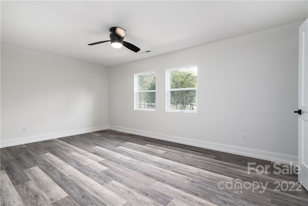 990 Dunlap Roddey Road Rock Hill, SC 29730 - Photo 20 of 28 wooden floor in an empty room with a window