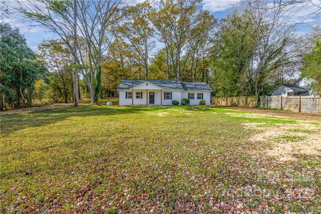 990 Dunlap Roddey Road Rock Hill, SC 29730 - Photo 23 of 28 a view of a house with a big yard and large trees