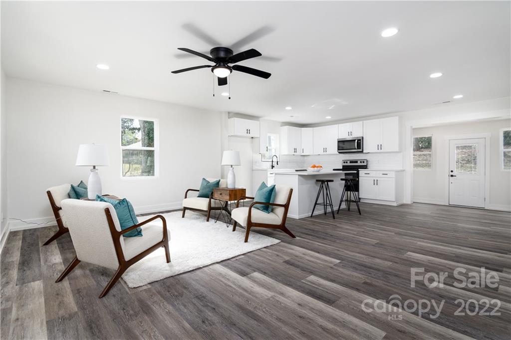 990 Dunlap Roddey Road Rock Hill, SC 29730 - Photo 5 of 28 a living room with furniture and kitchen view