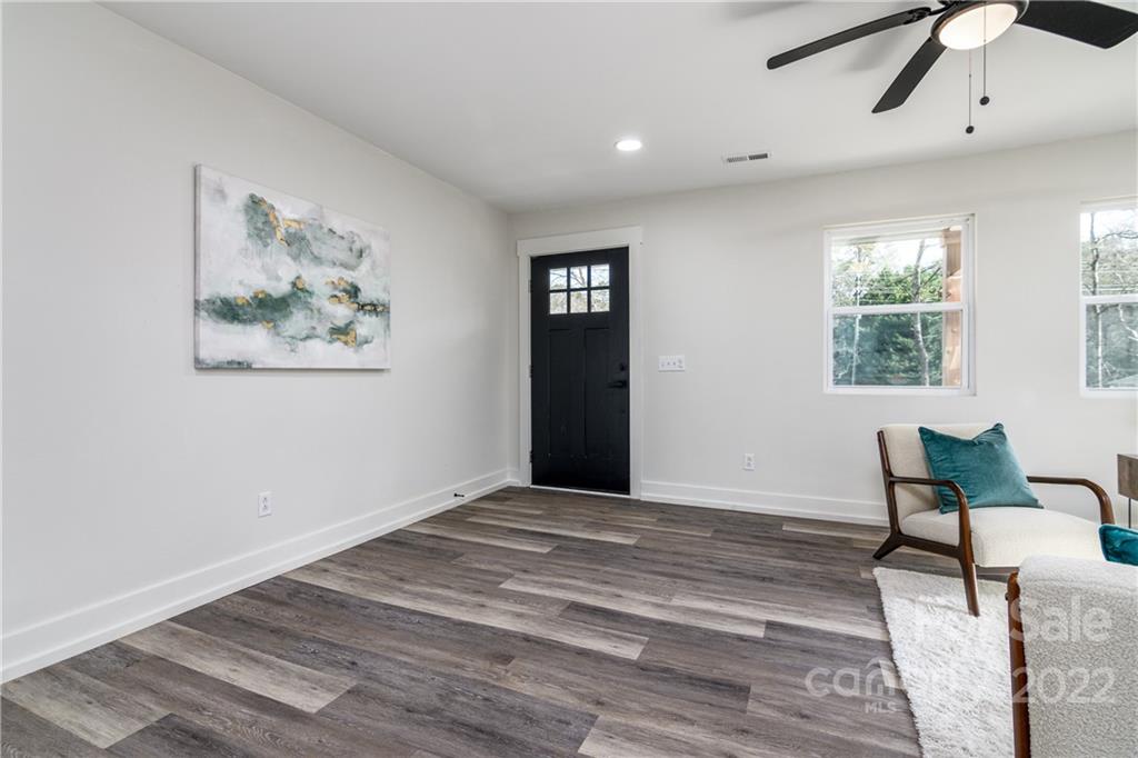 990 Dunlap Roddey Road Rock Hill, SC 29730 - Photo 6 of 28 a view of an empty room with window and wooden floor