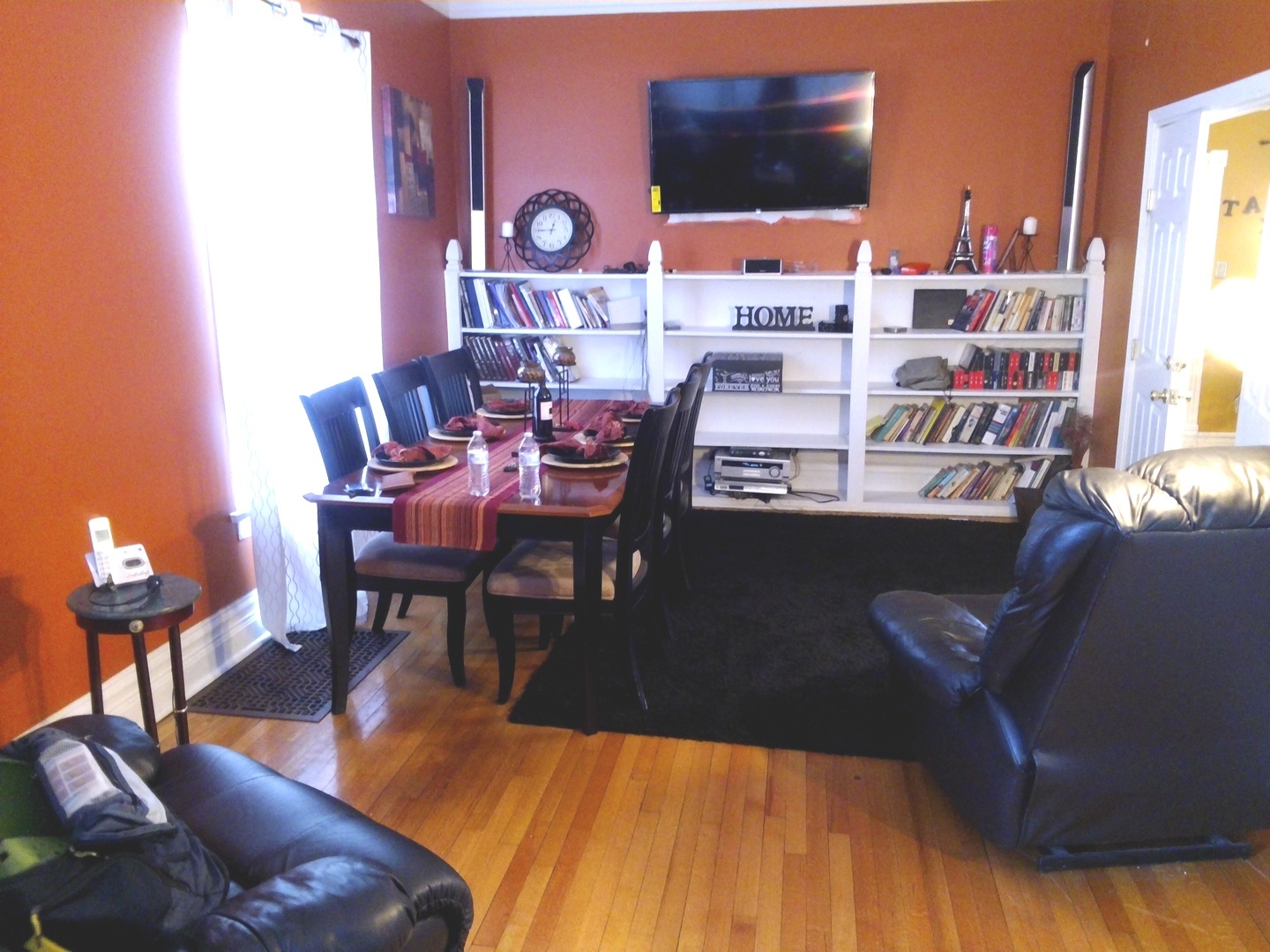 2665 East 77th Street Chicago, IL 60649 - Photo 11 of 46 a living room with furniture and a flat screen tv
