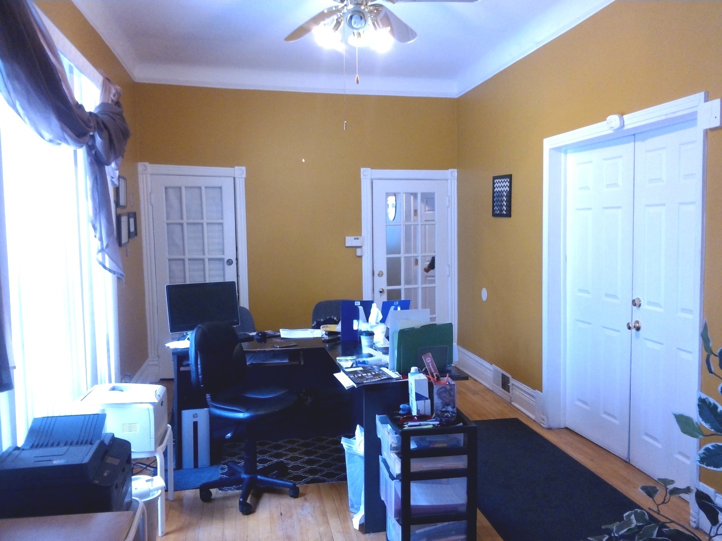 2665 East 77th Street Chicago, IL 60649 - Photo 14 of 46 a view of a dining room with furniture and wooden floor