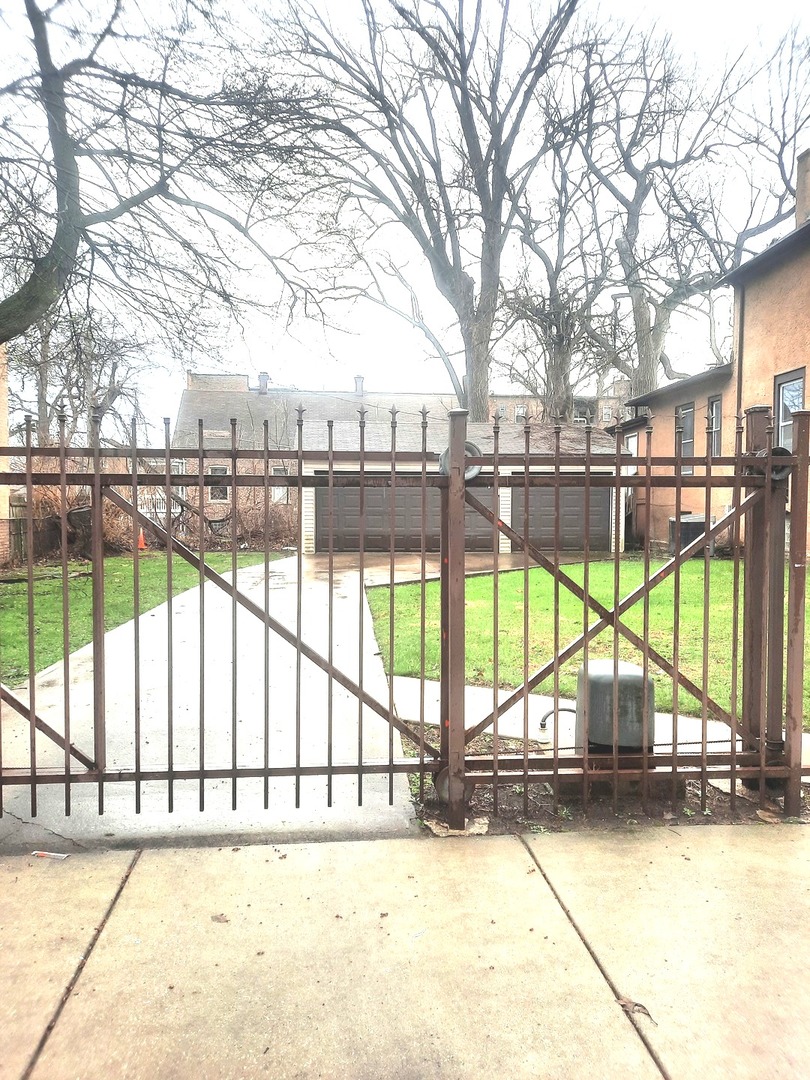2665 East 77th Street Chicago, IL 60649 - Photo 46 of 46 a view of a swimming pool with a outdoor space