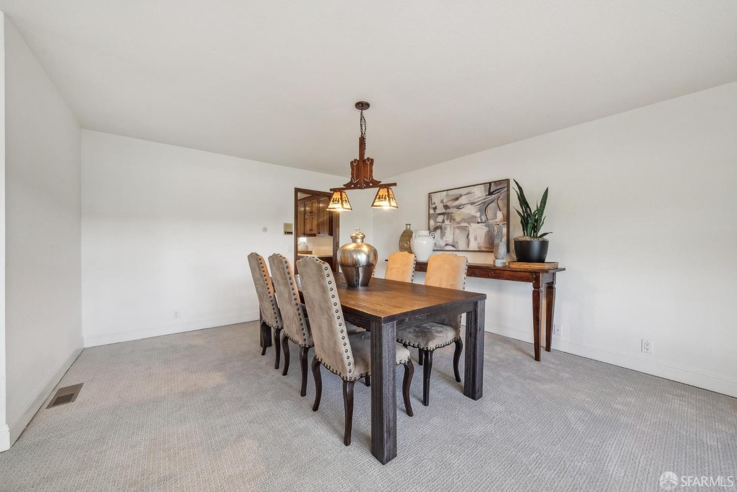 4355 Raymond Road Livermore, CA 94551 - Photo 11 of 74 a dining room with furniture and window