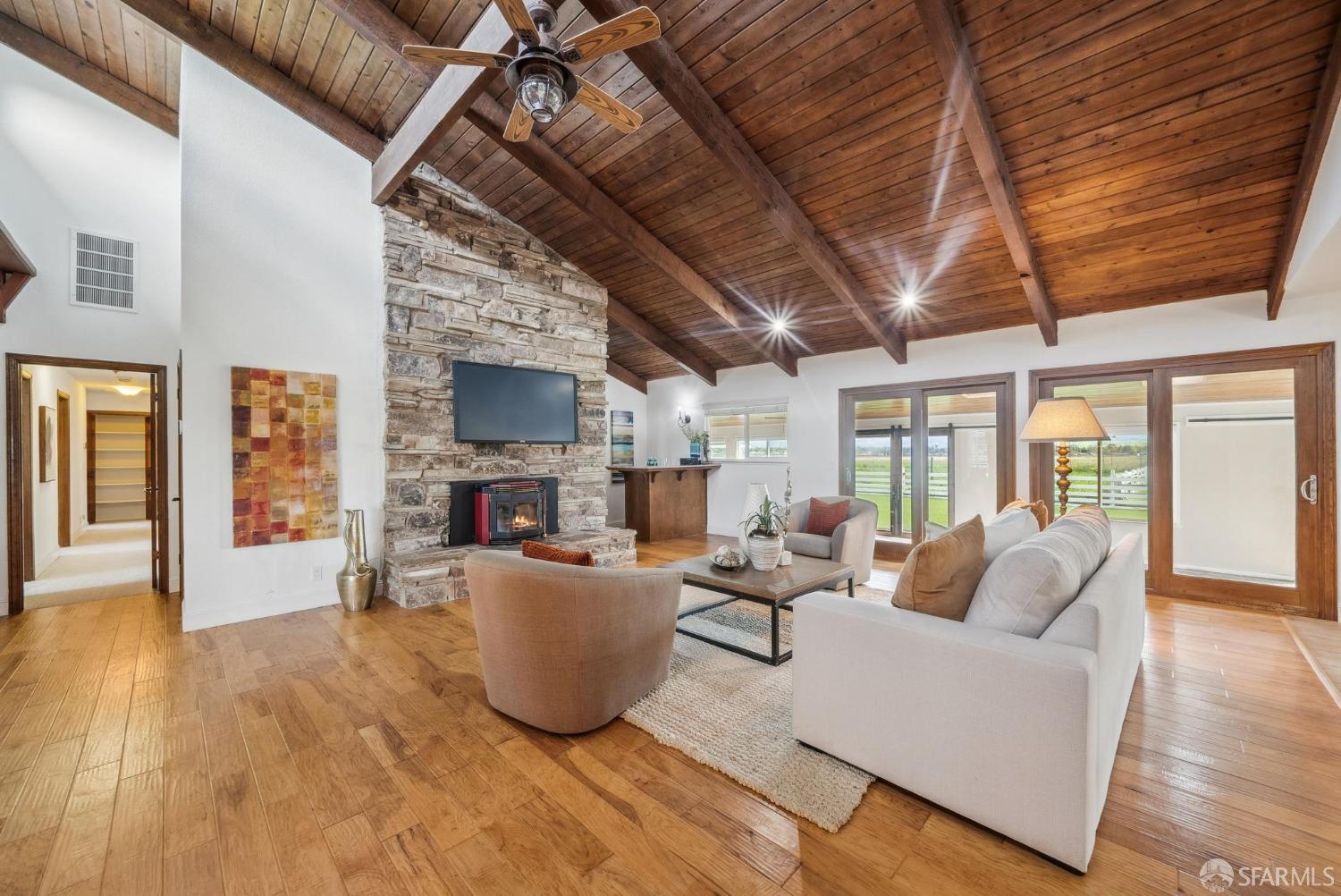 4355 Raymond Road Livermore, CA 94551 - Photo 21 of 74 a living room with furniture and a fireplace