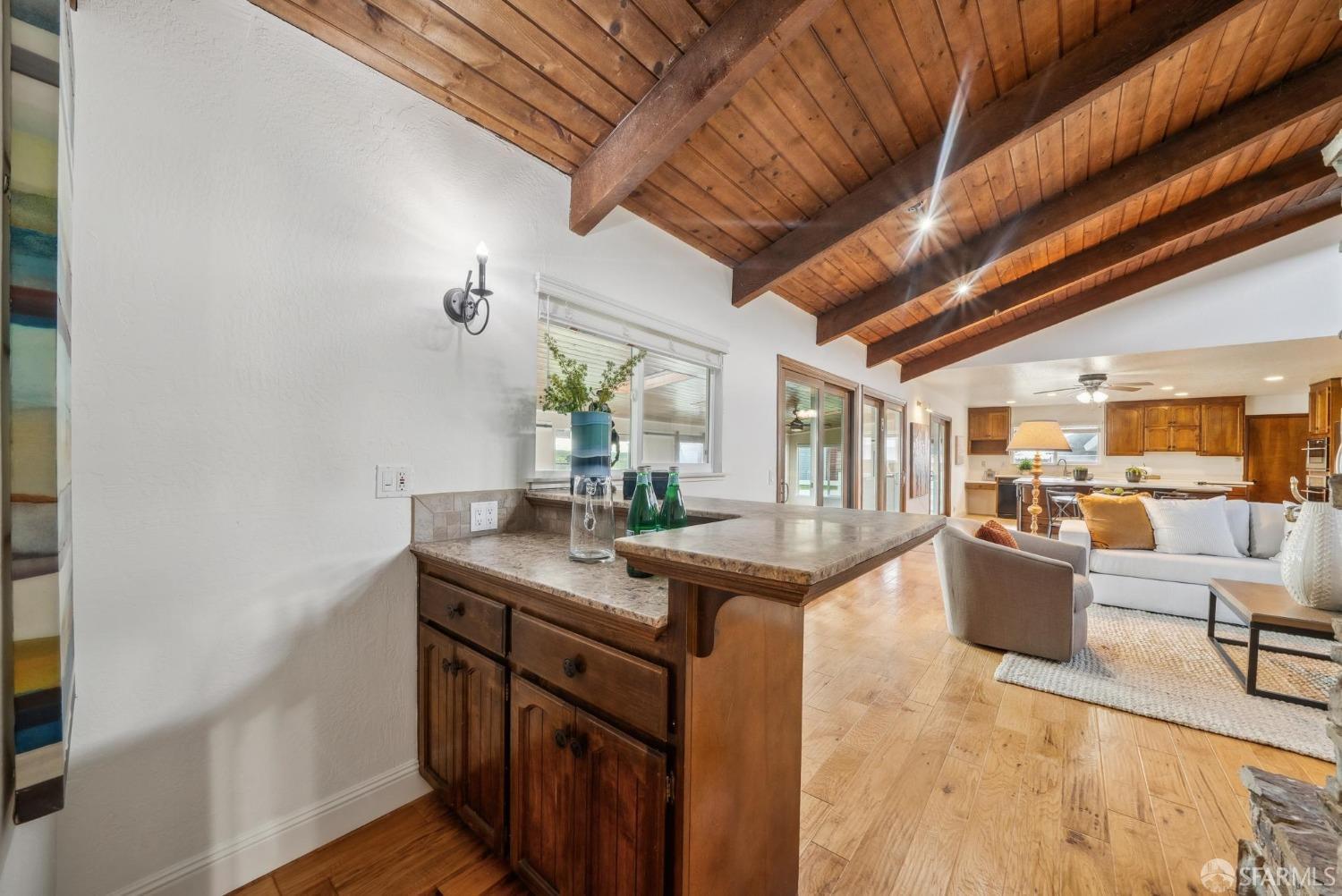 4355 Raymond Road Livermore, CA 94551 - Photo 24 of 74 a view of a kitchen with furniture and wooden floor