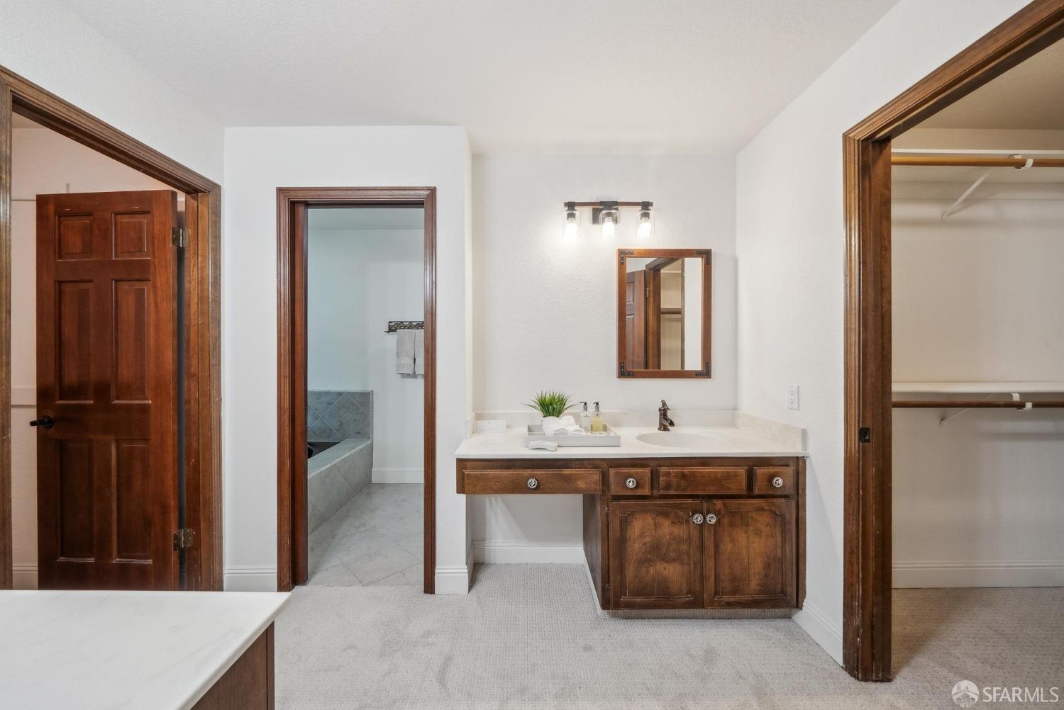 4355 Raymond Road Livermore, CA 94551 - Photo 29 of 74 a bathroom with a sink and a mirror