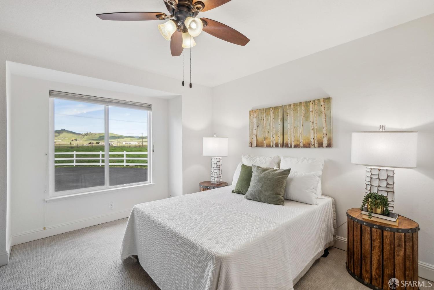 4355 Raymond Road Livermore, CA 94551 - Photo 37 of 74 a bedroom with a bed and a window