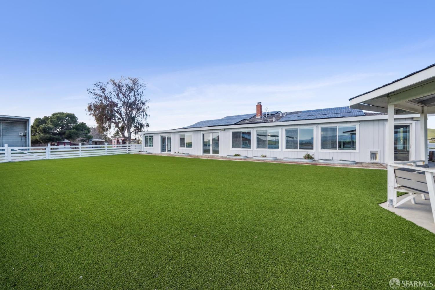 4355 Raymond Road Livermore, CA 94551 - Photo 50 of 74 a front view of house with yard and trees in the background