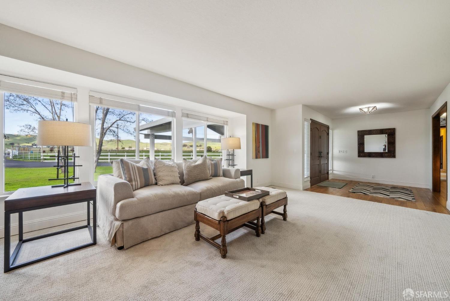 4355 Raymond Road Livermore, CA 94551 - Photo 9 of 74 a living room with furniture and a floor to ceiling window