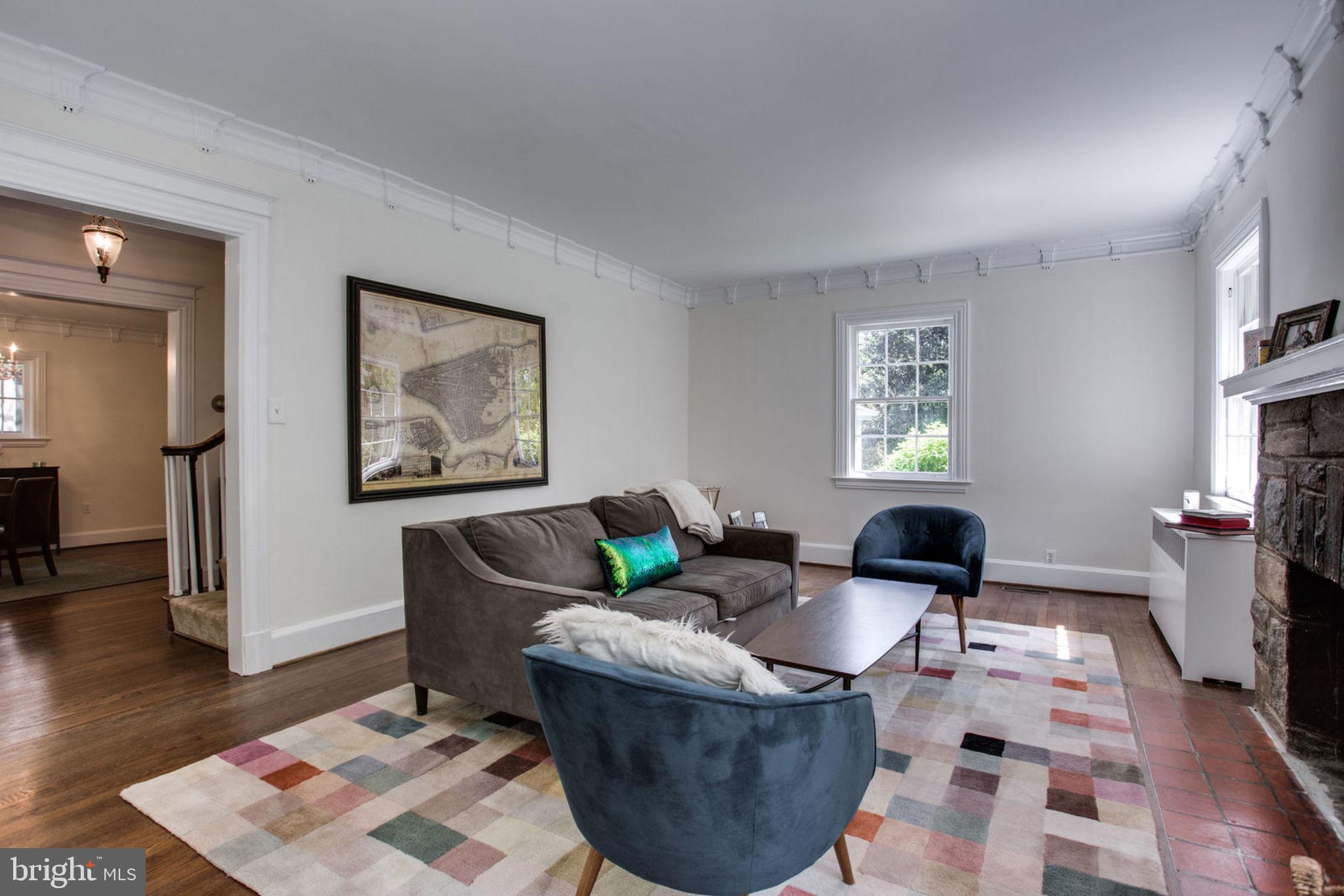 5023 Reno Road Northwest Washington, DC 20008 - Photo 6 of 33 Light filled living room spacious for entertaining