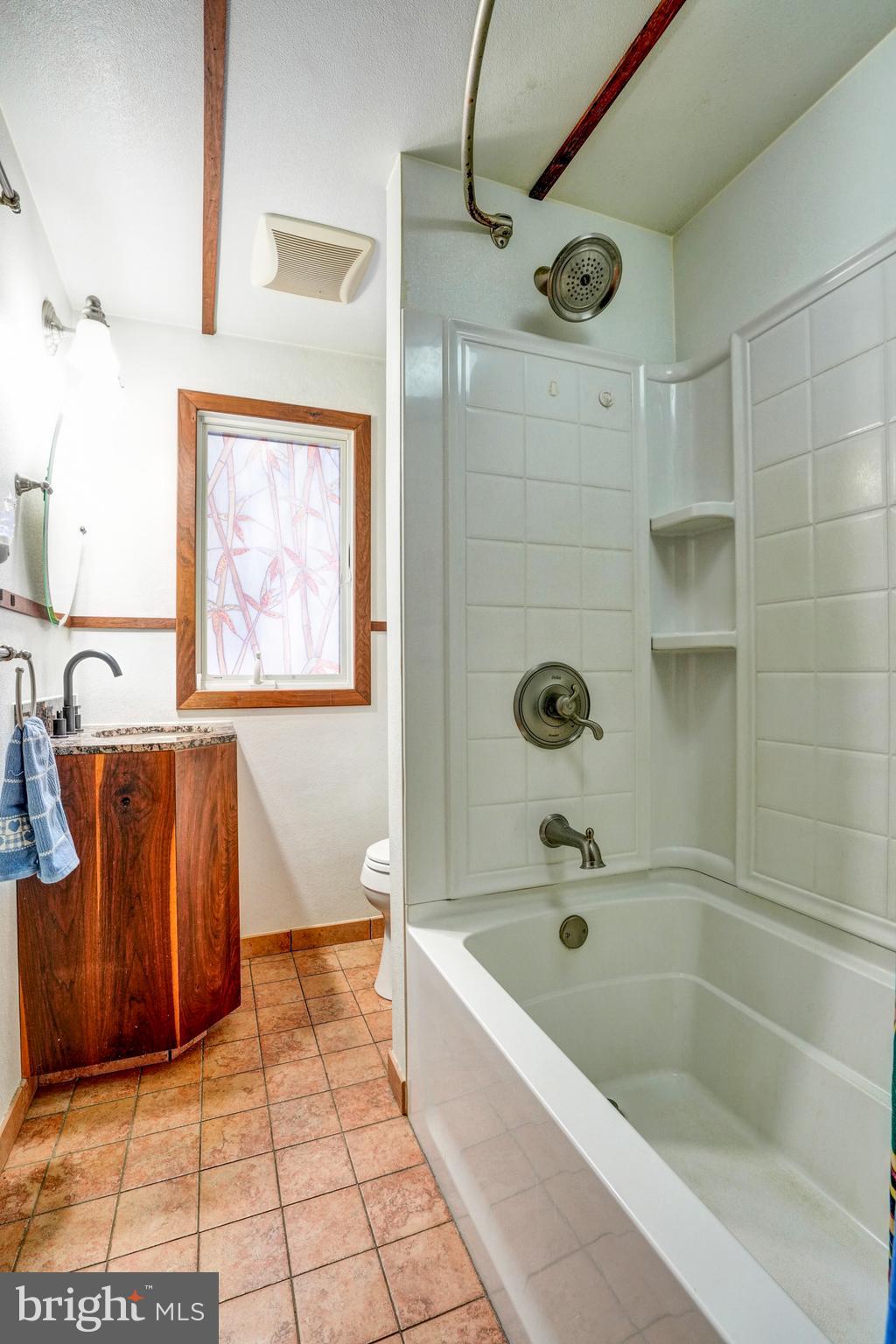 1211 Old Schuylkill Road Pottstown, PA 19465 - Photo 21 of 54 a bathroom with a bathtub and a shower