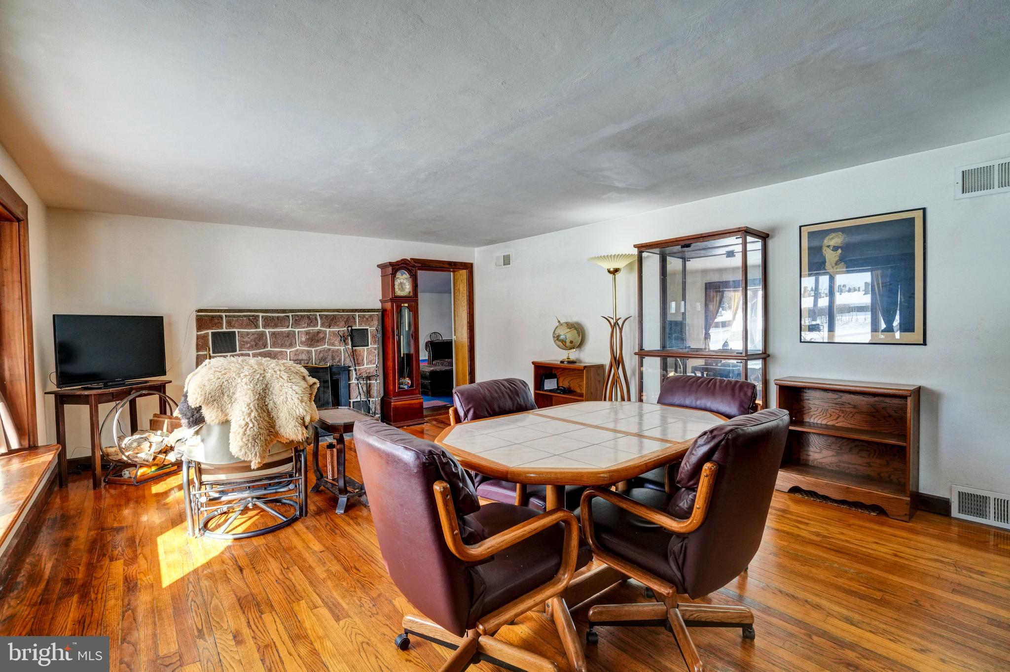 1211 Old Schuylkill Road Pottstown, PA 19465 - Photo 30 of 54 a dining room with furniture and wooden floor