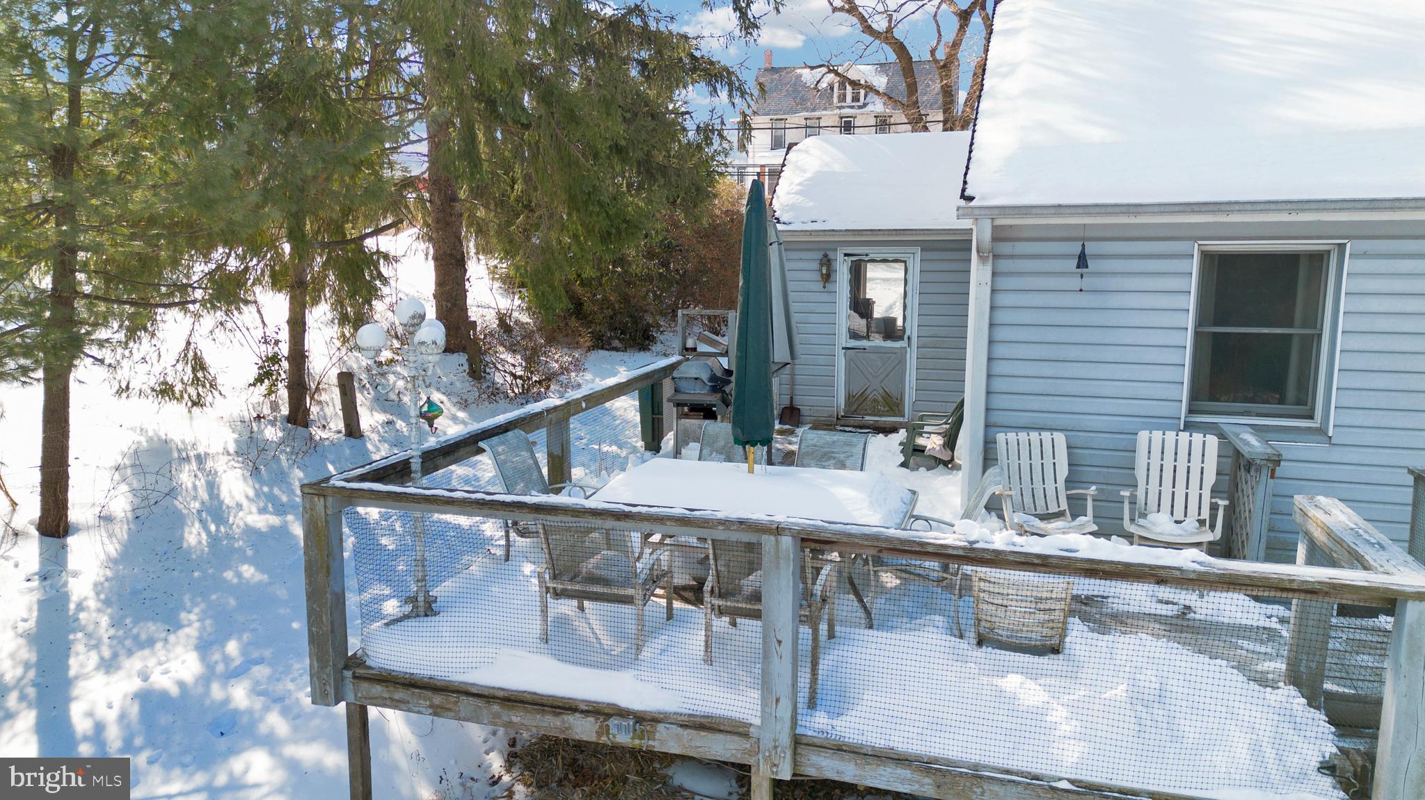 1211 Old Schuylkill Road Pottstown, PA 19465 - Photo 42 of 54 a balcony with table and chairs