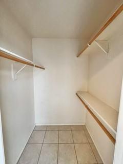 1707 Tina Marie Road, Unit A Arlington, TX 76012 - Photo 26 of 34 Walk in closet in primary bedroom