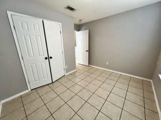 1707 Tina Marie Road, Unit A Arlington, TX 76012 - Photo 30 of 34 Bedroom 3 featuring double door closet