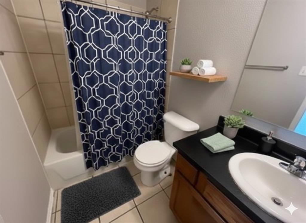 1707 Tina Marie Road, Unit A Arlington, TX 76012 - Photo 10 of 34 Full bathroom with virtual staging