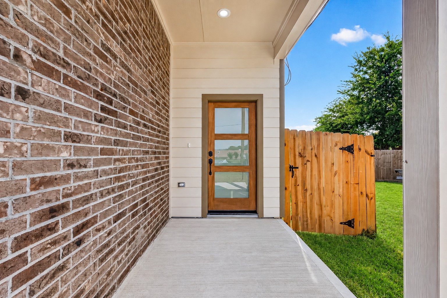 8110 Carver Road Houston, TX 77088 - Photo 3 of 38 Covered front entry creates a welcoming arrival and a defined entrance for each residence.
