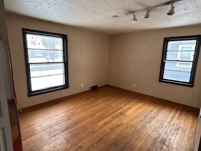 an empty room with windows
