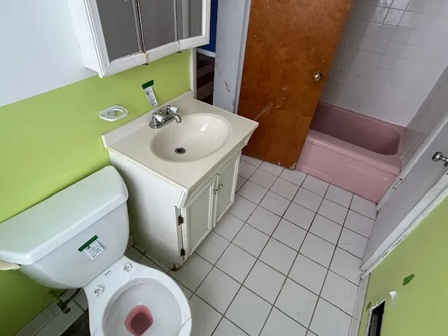 a bathroom with a sink and a toilet